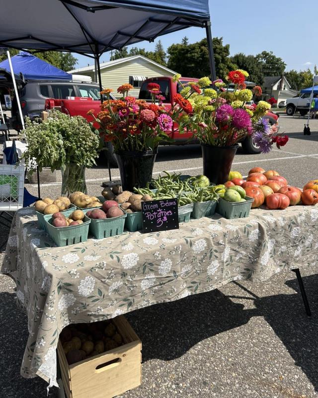 Fresh produce and flowers at the farmers market in St Louis,  Michigan