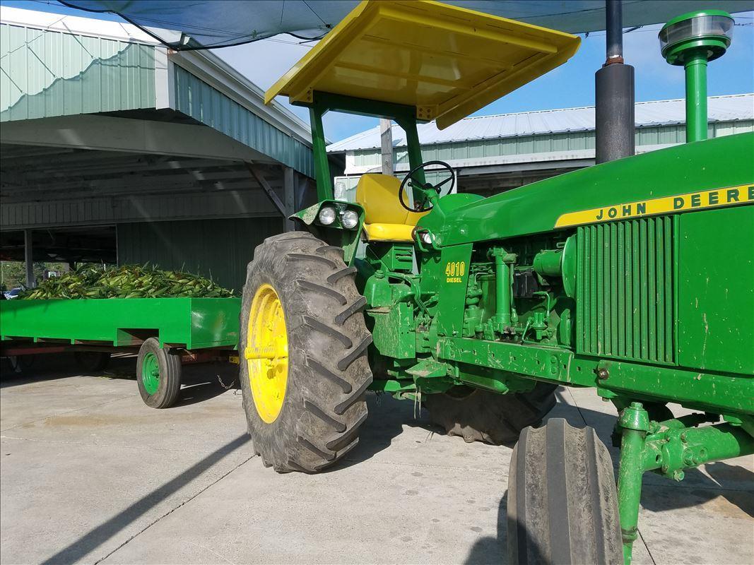 Tractor with sweet corn at Blocks Farm Market in Romulus