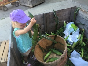 Emma Grace helping her Grandma