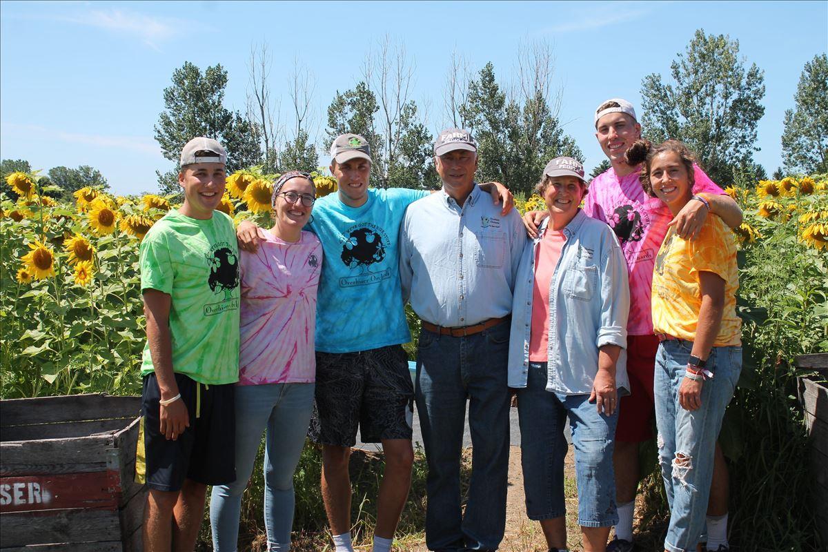 A.W. Overhiser Orchards Family in the sunflower field