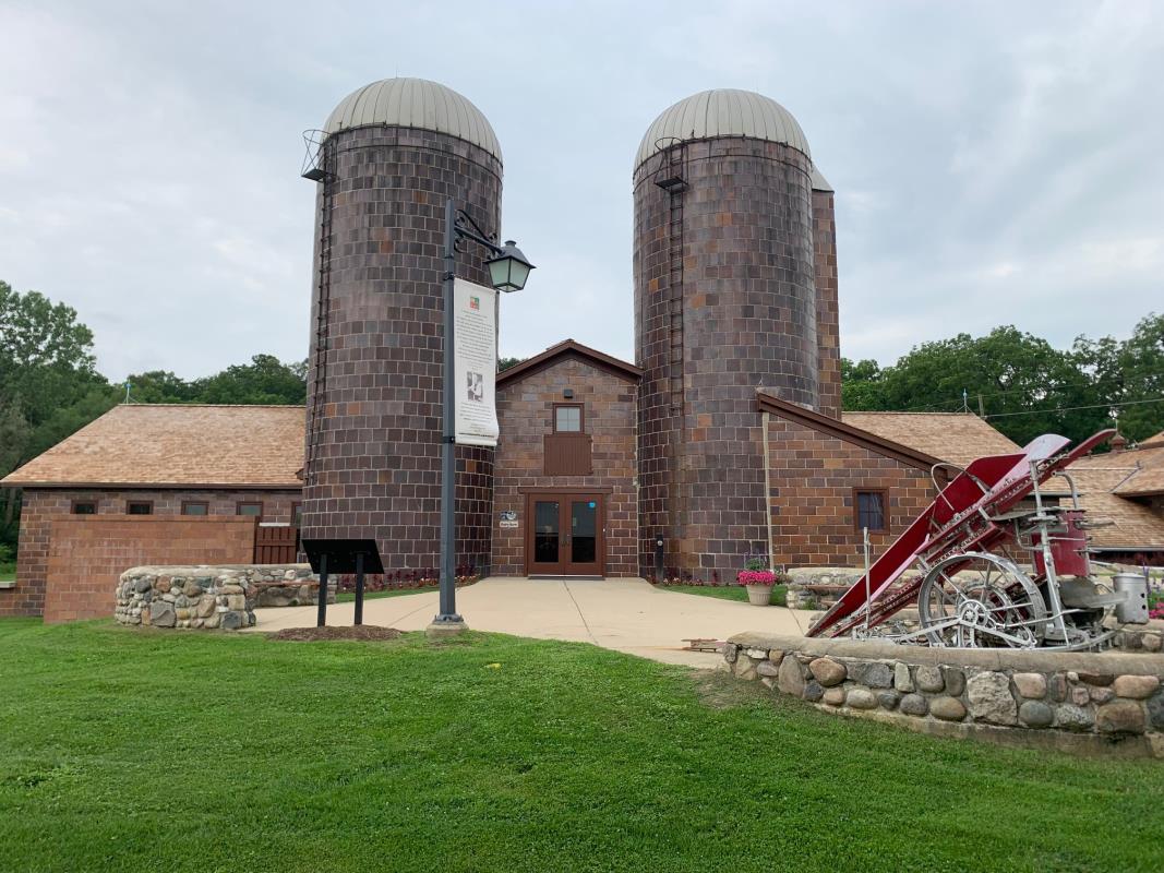 Silos, barns, grass
